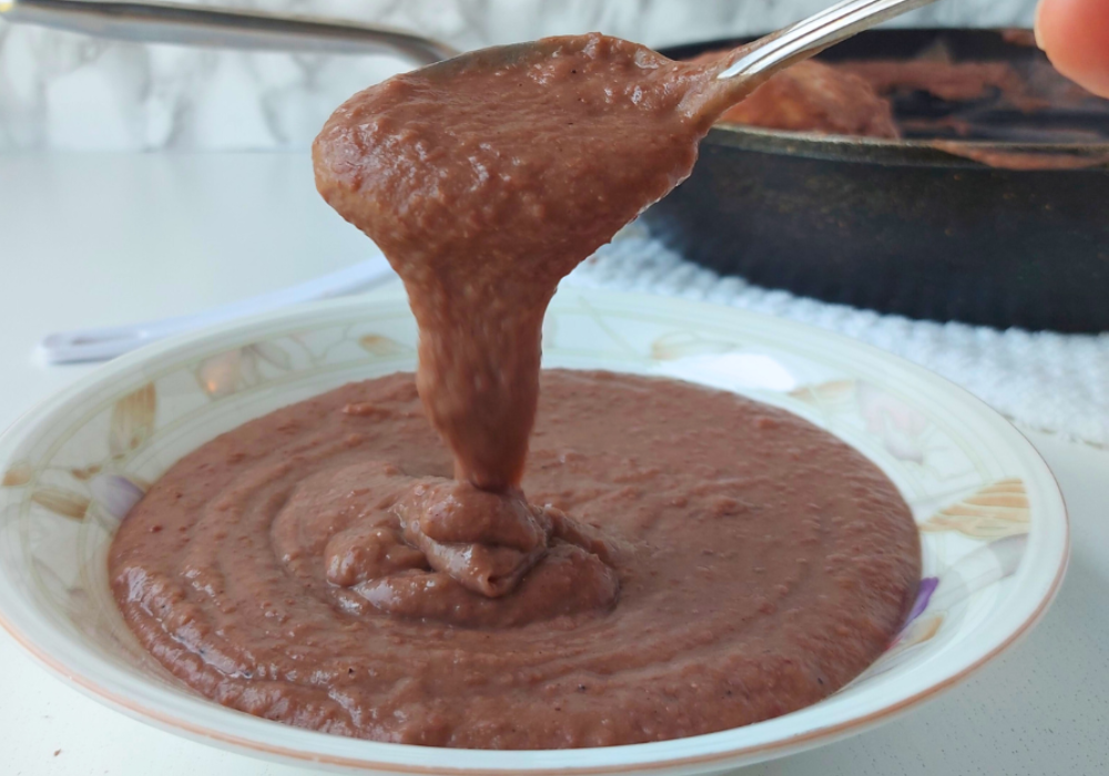 honduran refried beans frijoles close up in bowl